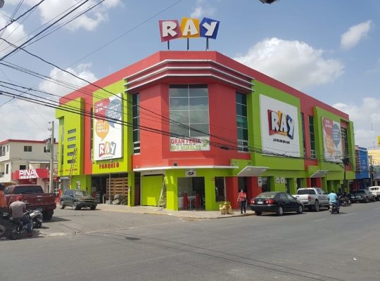 A vibrant building with a prominent sign.