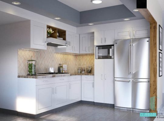 A modern kitchen with stainless steel appliances and white cabinets.